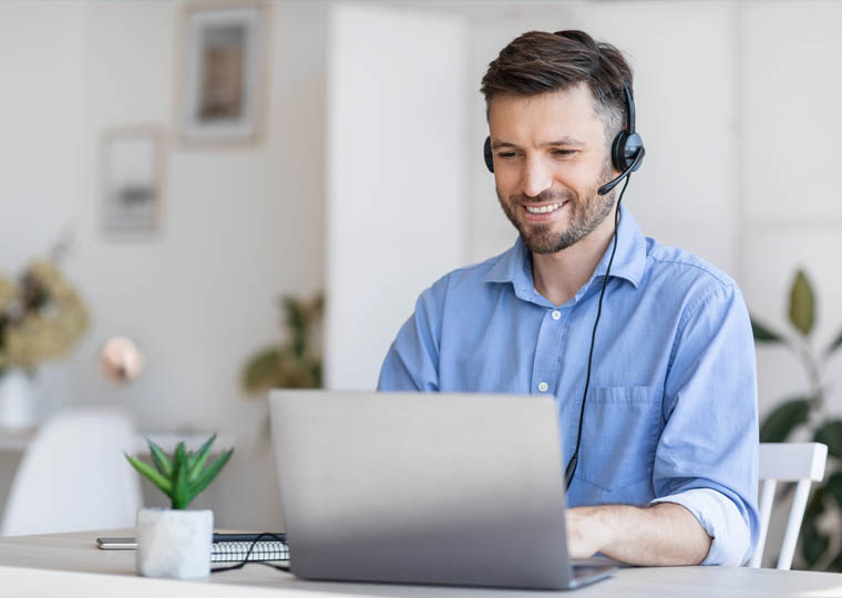 Customer Support personnel answering a phone call for HBS Systems